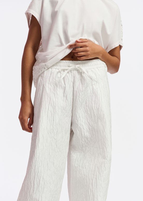 Pantaloni a gamba larga in jacquard floreale bianco sporco