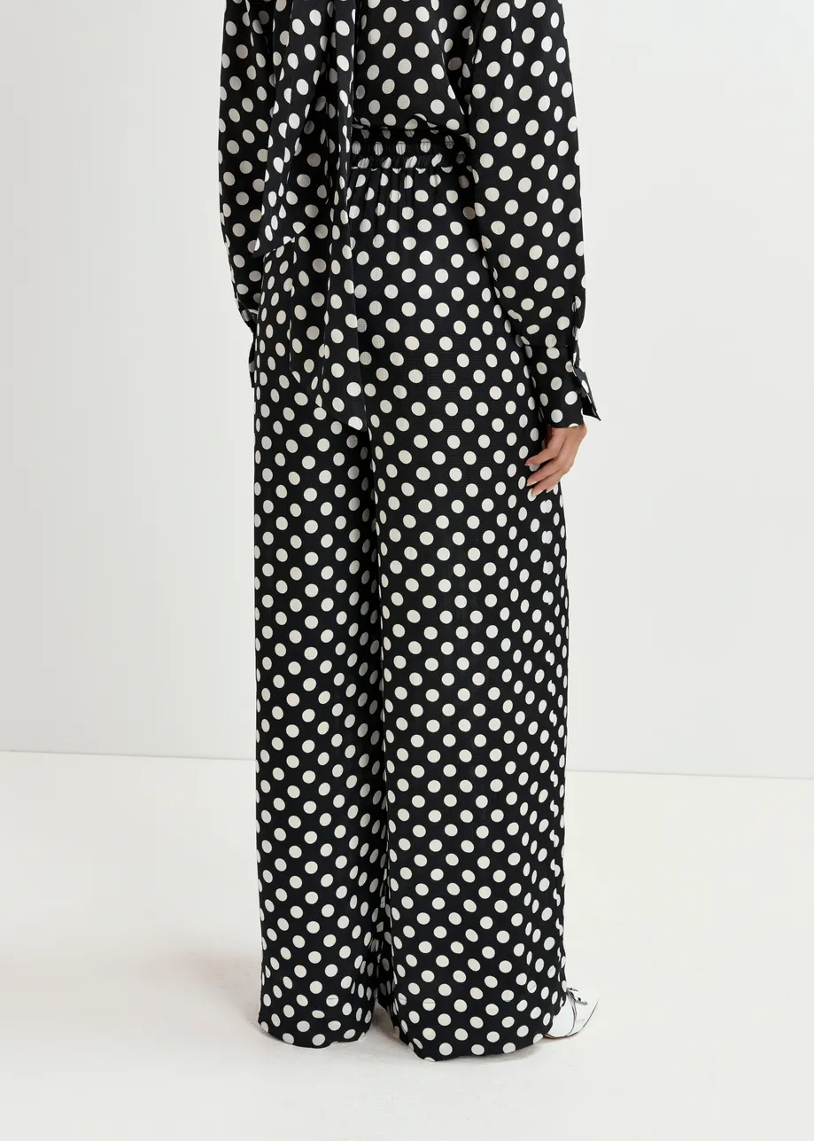 Black and white polka-dot wide-leg pants