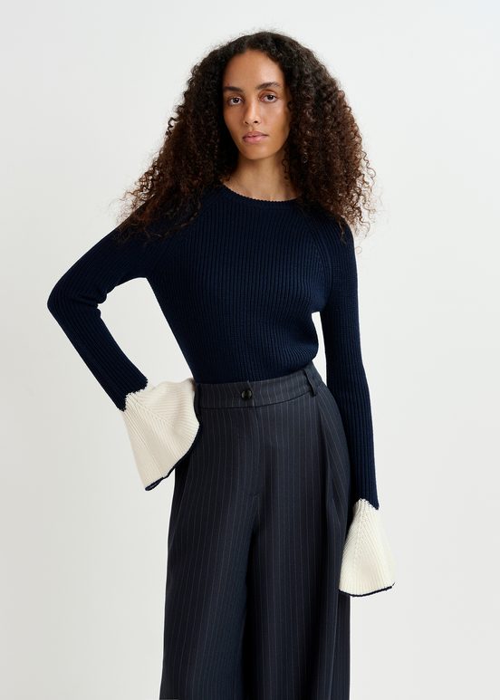 Navy blue rib-knitted sweater with flared cuffs