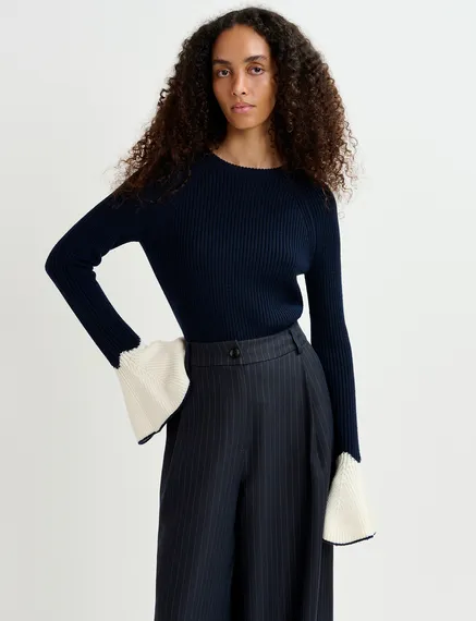 Navy blue rib-knitted sweater with flared cuffs