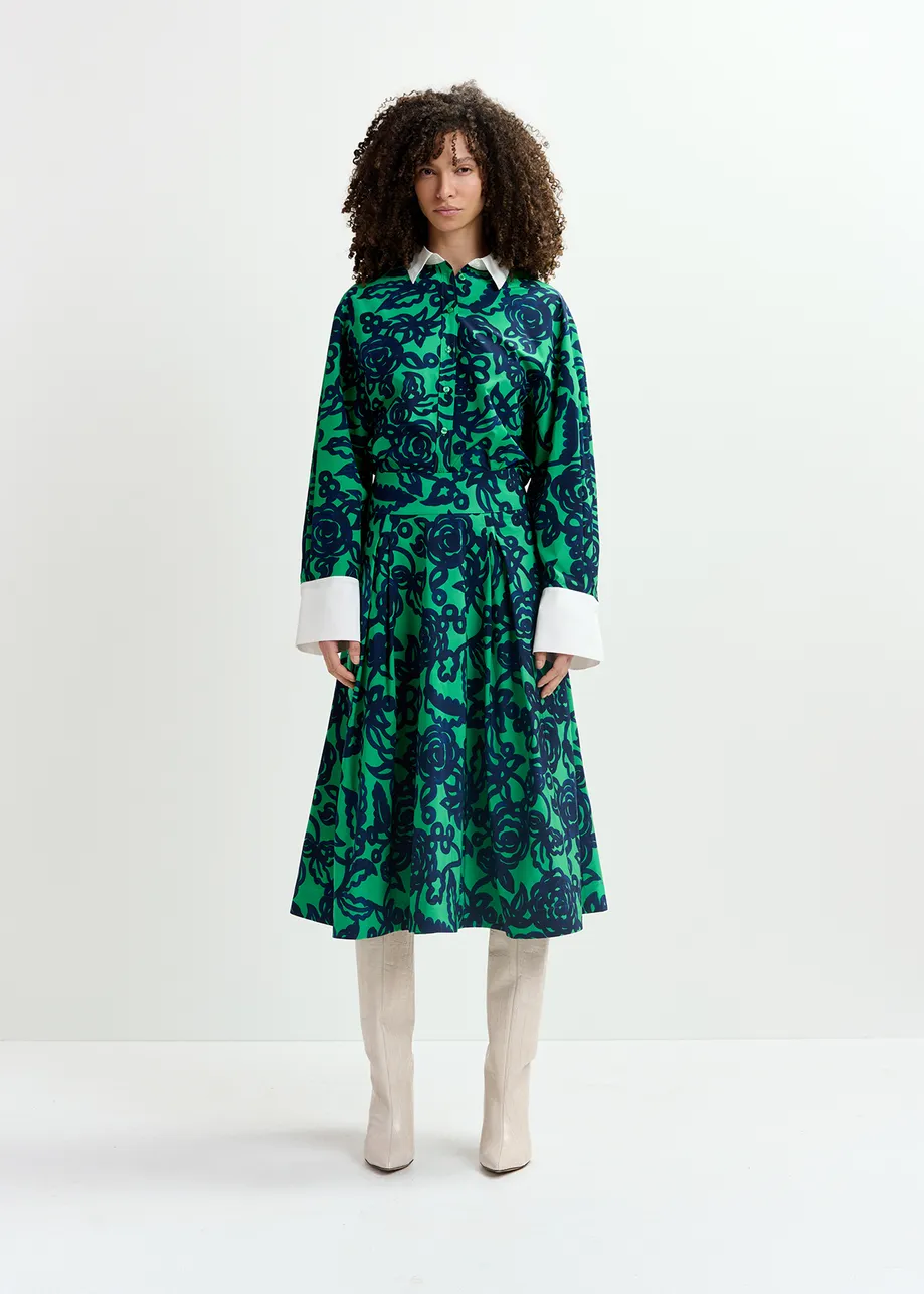 Groene en donkerblauwe midi-plissérok met bloemprint