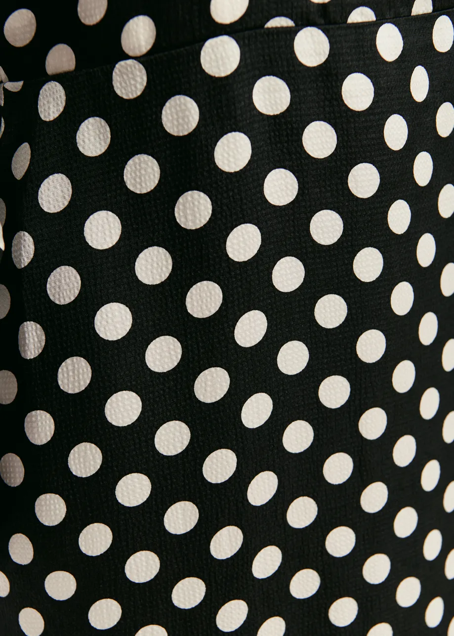 Black and white polka-dot midi dress with kimono sleeves