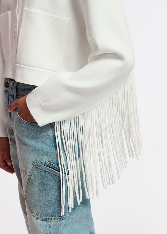 Veste tricotée blanc cassé avec franges