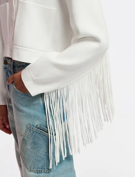 Veste tricotée blanc cassé avec franges