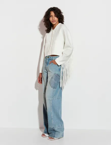 Off-white knitted jacket with fringes