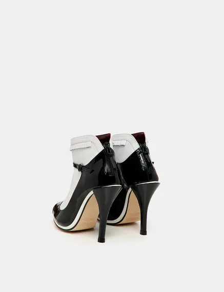 Black and white leather open-toe pumps