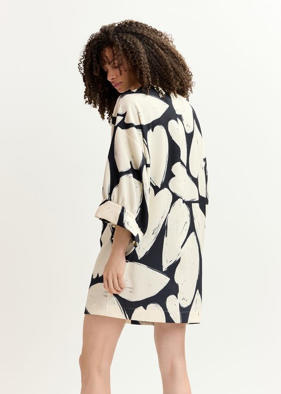 Black and off-white mini dress with wide sleeves