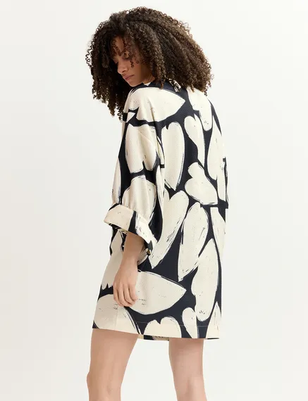 Mini-robe noire et blanc cassé à manches larges