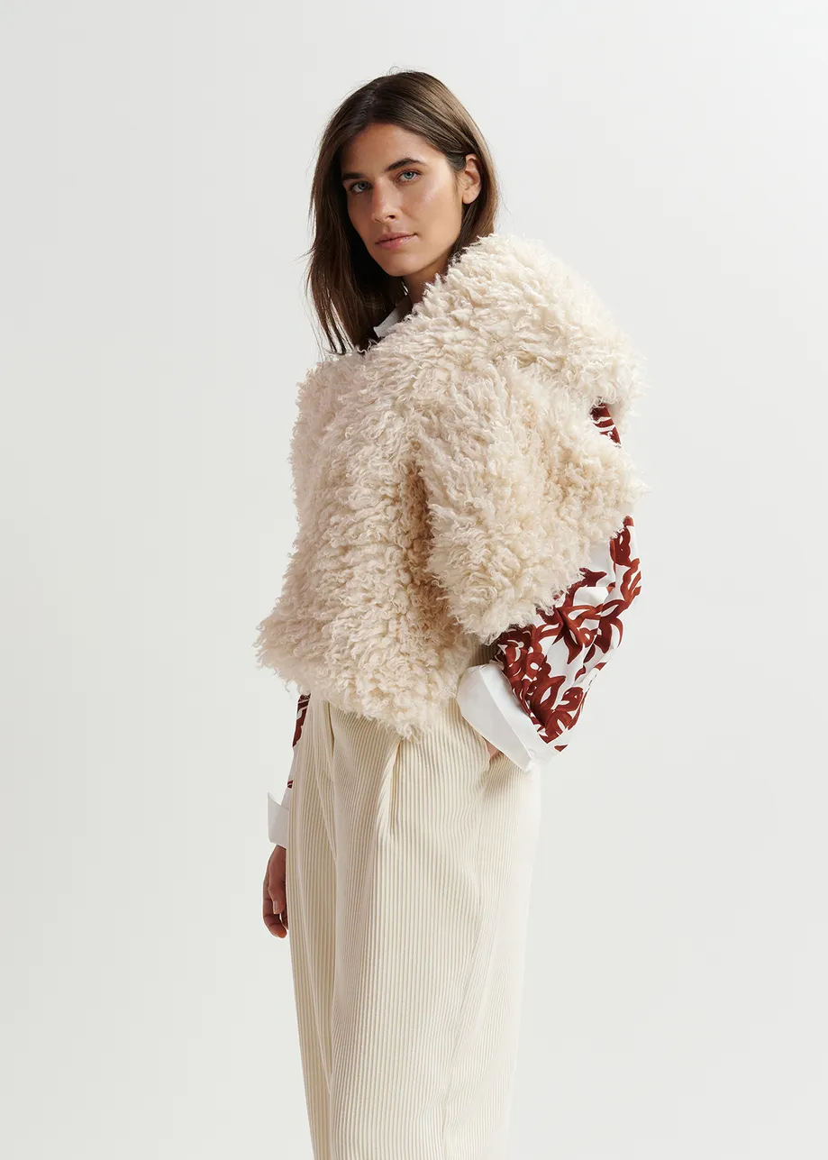 Ecru sjaal in faux shearling