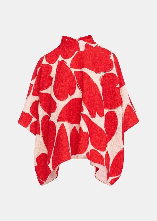 Top oversize con cuello alto, blanco roto y rojo