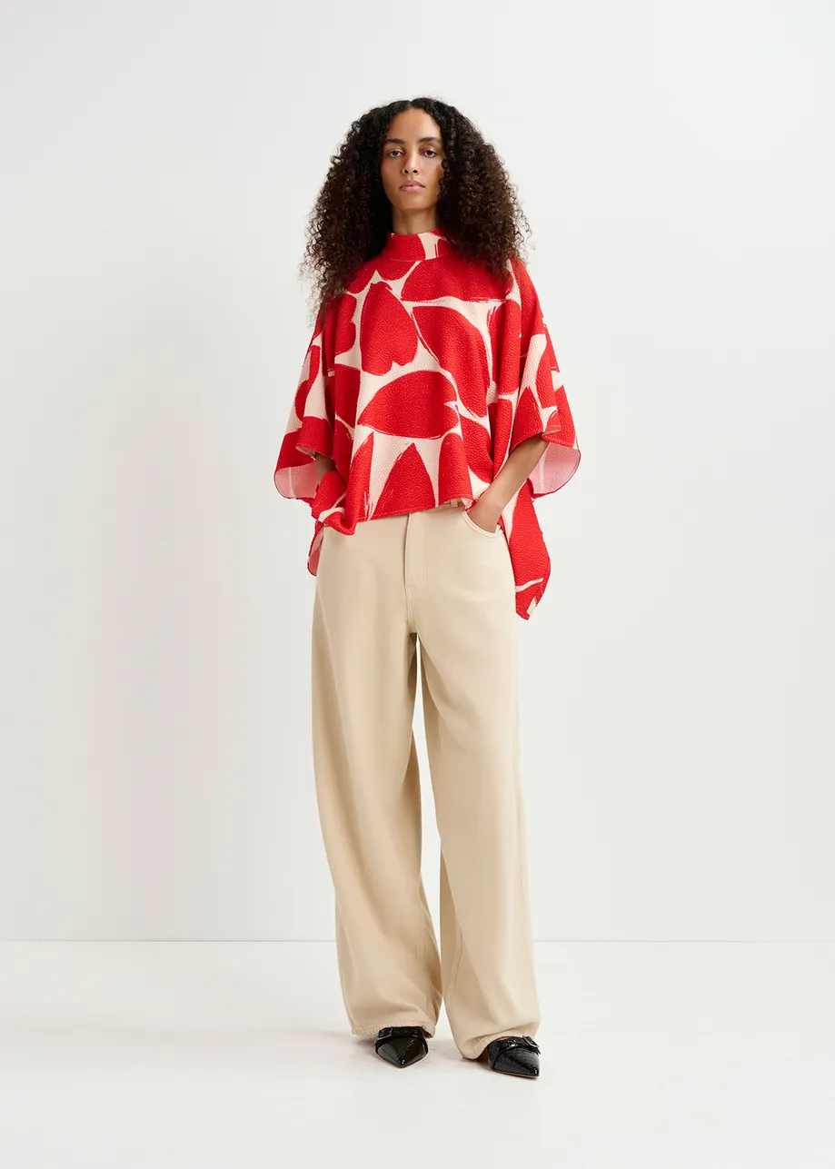 Off-white and red oversized top with stand-up collar