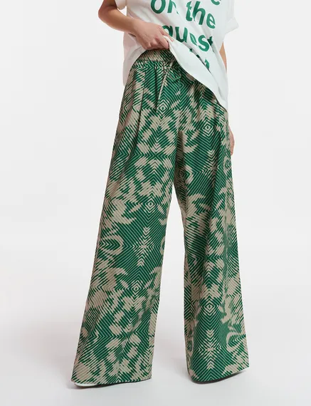 Beige and dark green wide-leg pants with geometric print