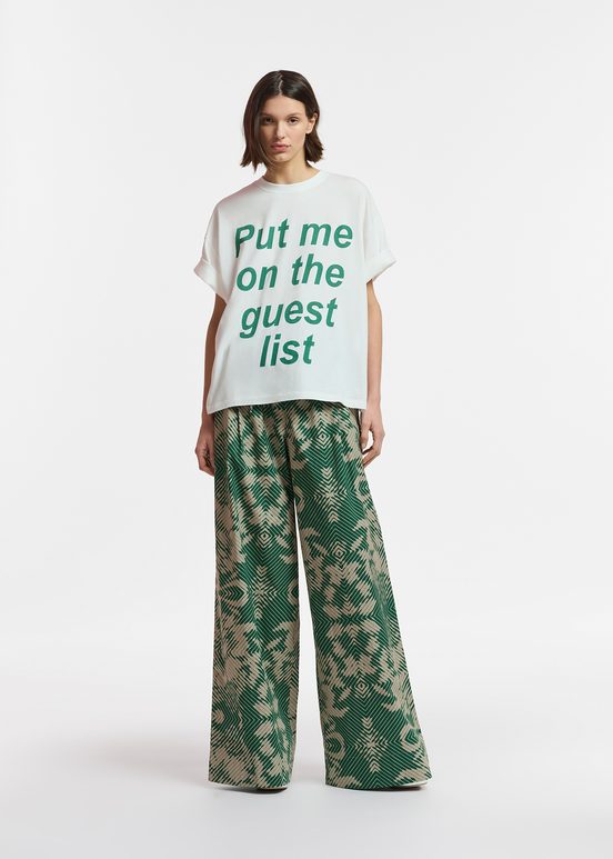 Beige and dark green wide-leg pants with geometric print