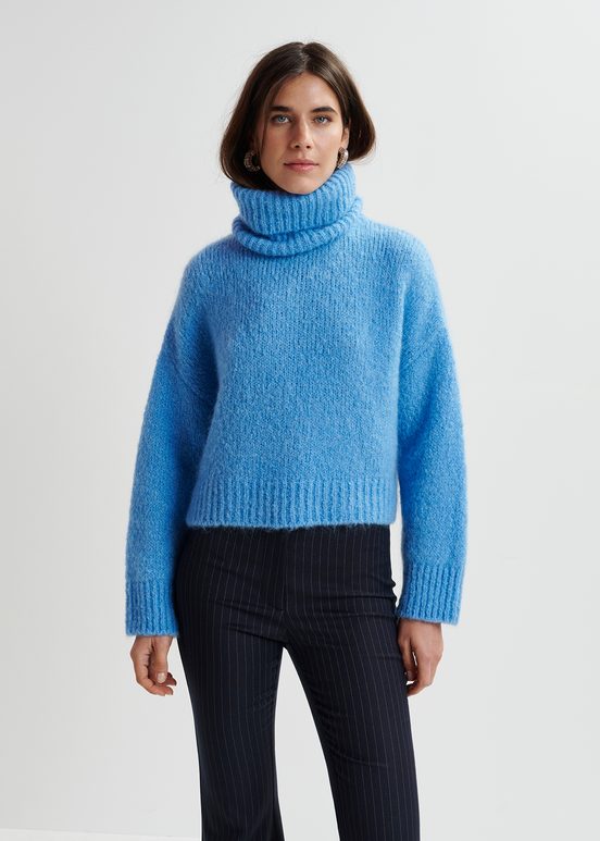 Blue turtleneck knit sweater