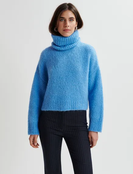 Blue turtleneck knit sweater