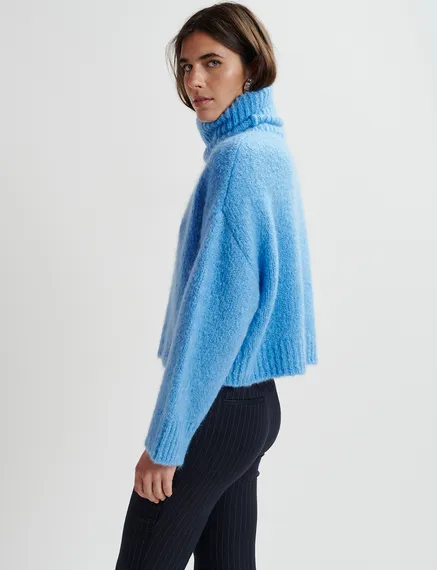 Blue turtleneck knit sweater