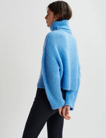 Blue turtleneck knit sweater