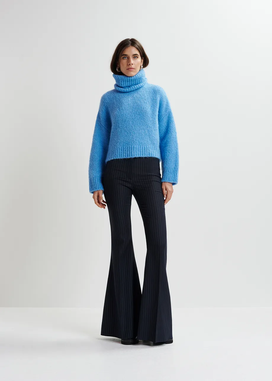 Blue turtleneck knit sweater