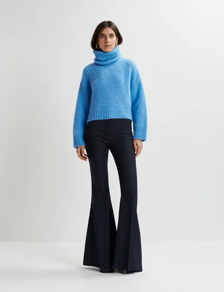 Blue turtleneck knit sweater