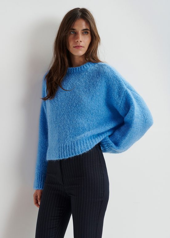 Blue turtleneck knit sweater