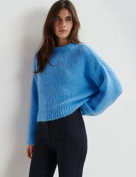 Blue turtleneck knit sweater