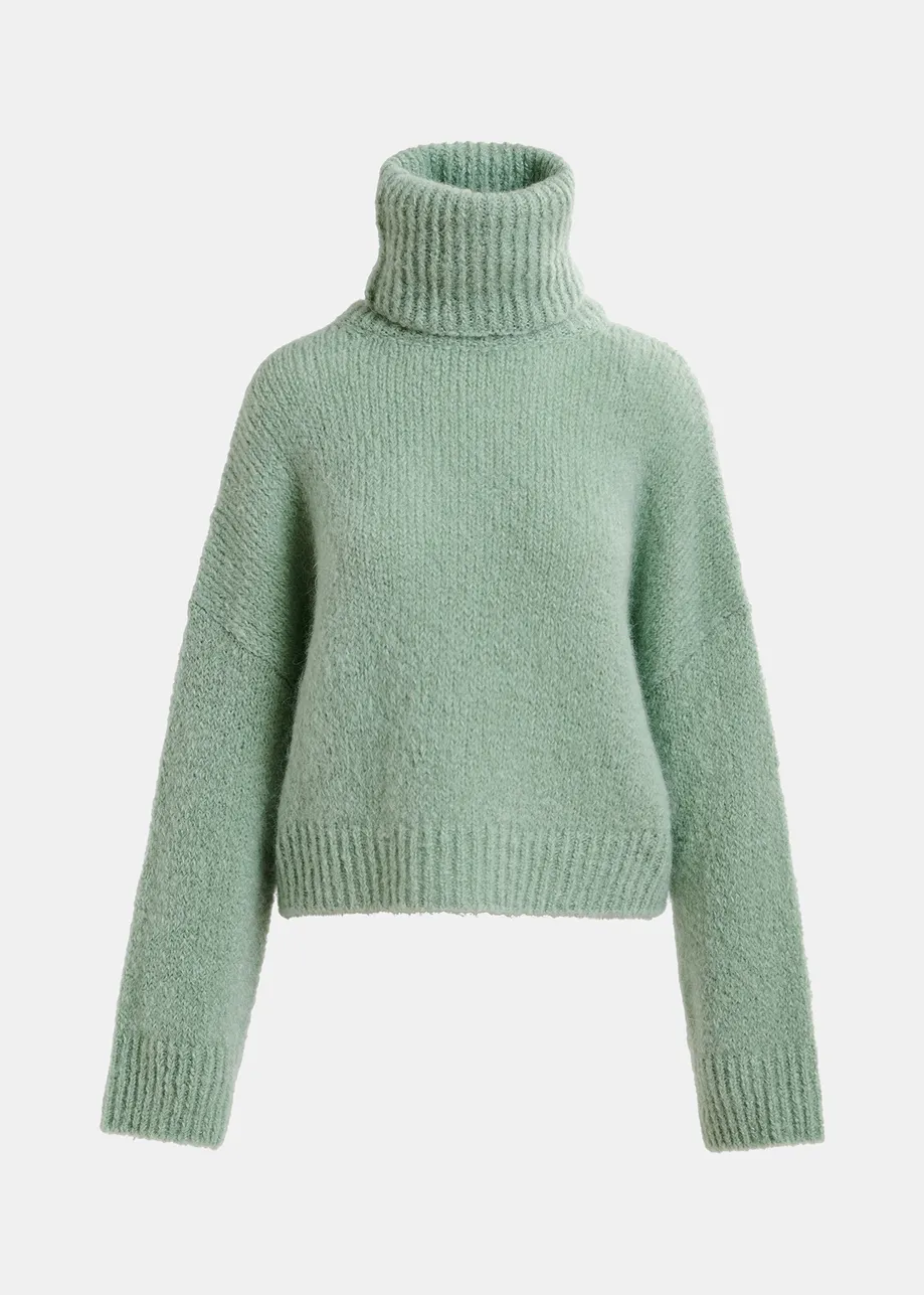 Maglione verde chiaro a collo alto 