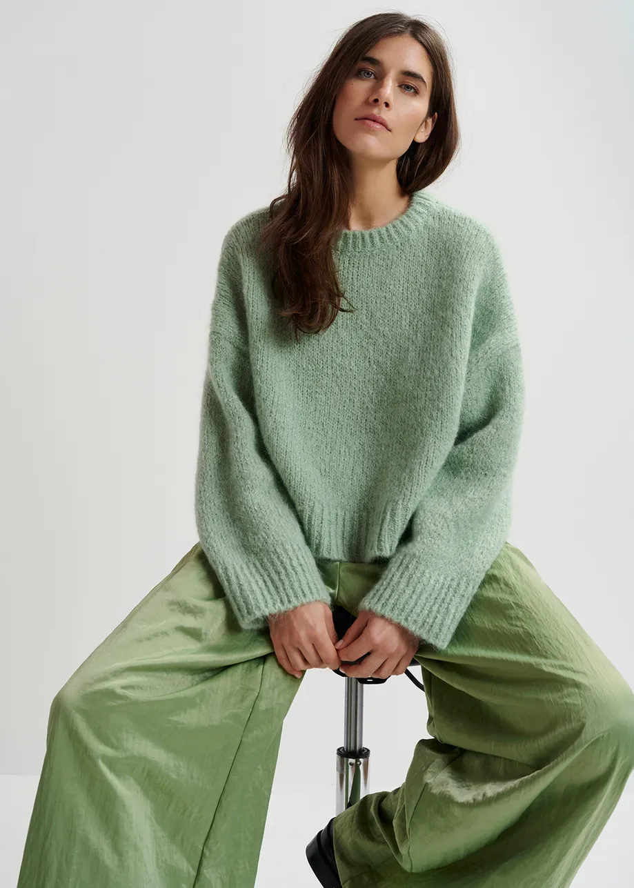 Light green turtleneck knit sweater