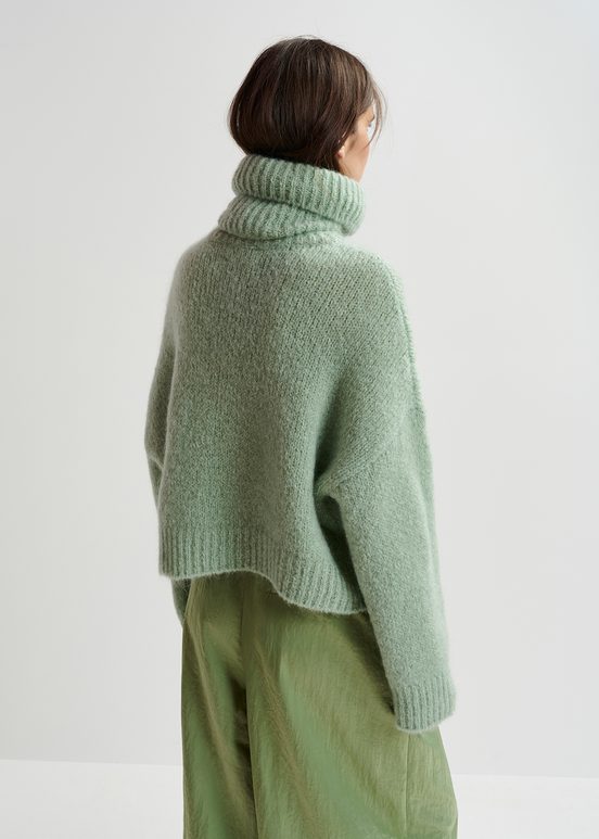 Light green turtleneck knit sweater