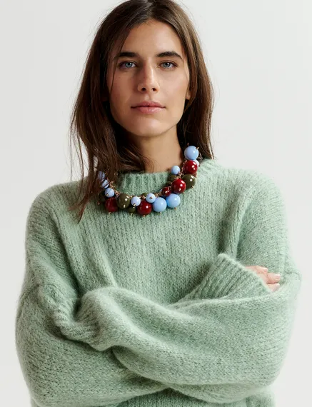 Light green turtleneck knit sweater