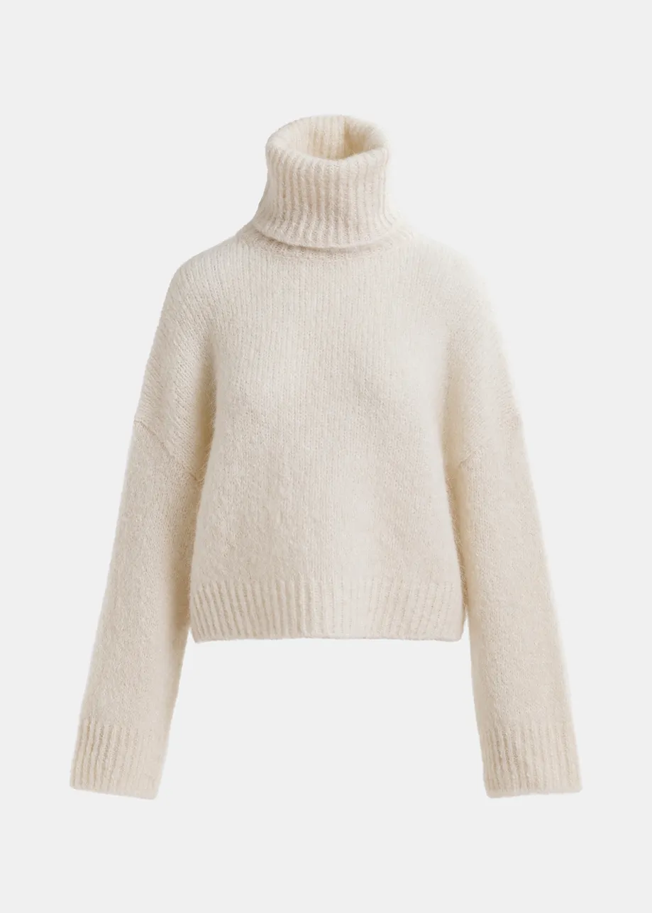 Ecru turtleneck knit sweater