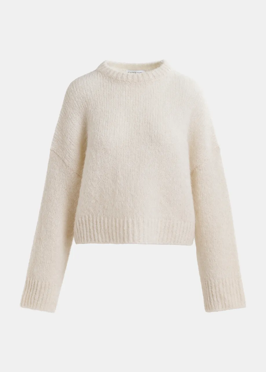 Ecru turtleneck knit sweater