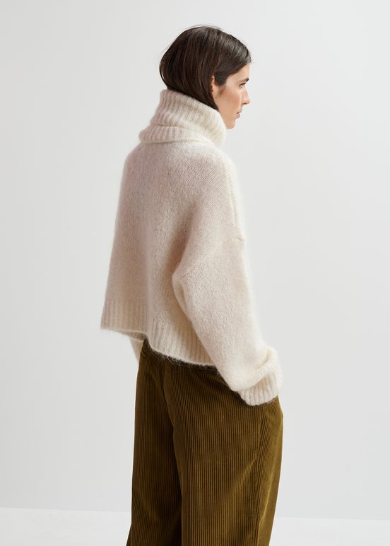 Ecru turtleneck knit sweater