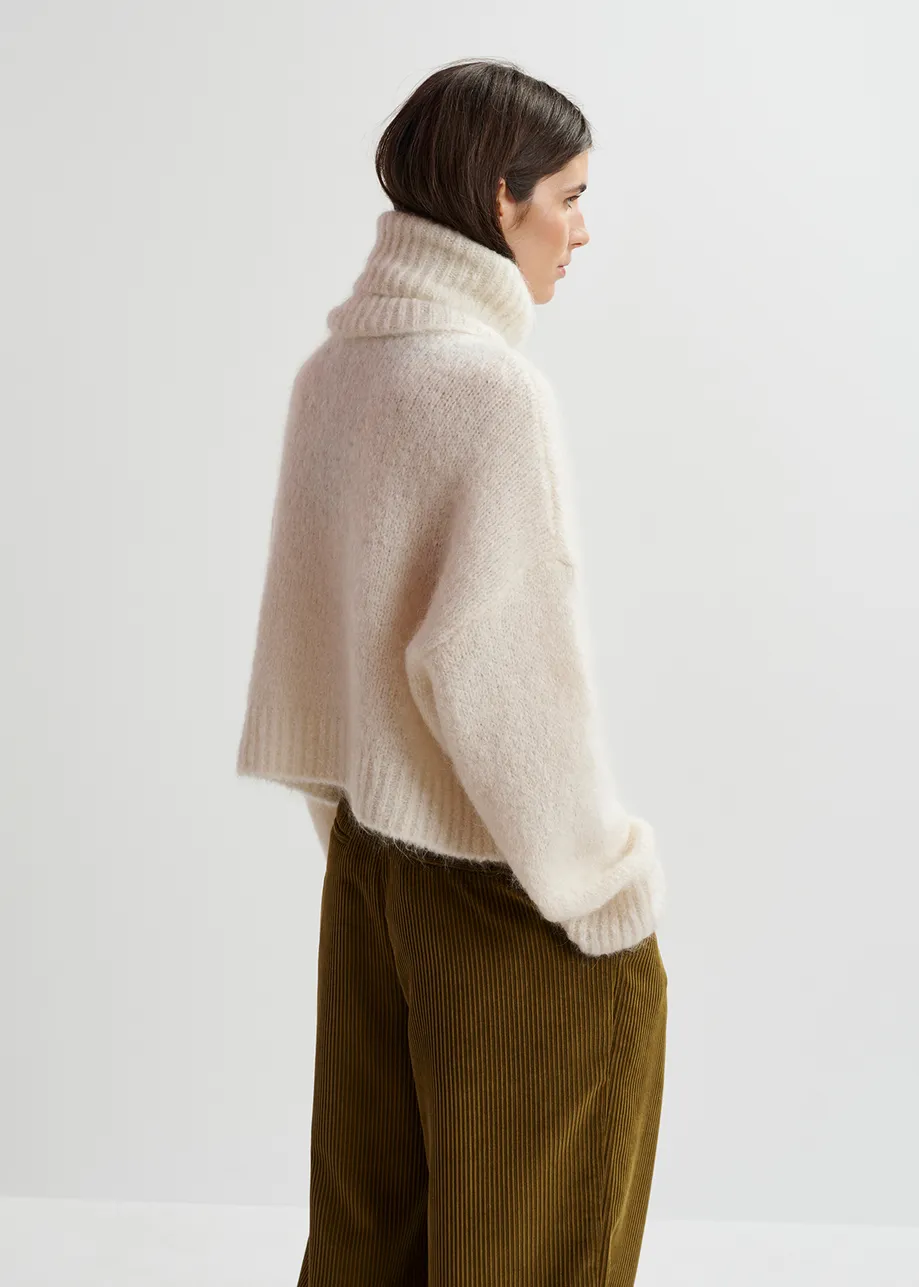 Ecru turtleneck knit sweater