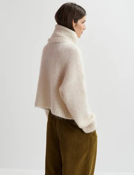 Ecru turtleneck knit sweater