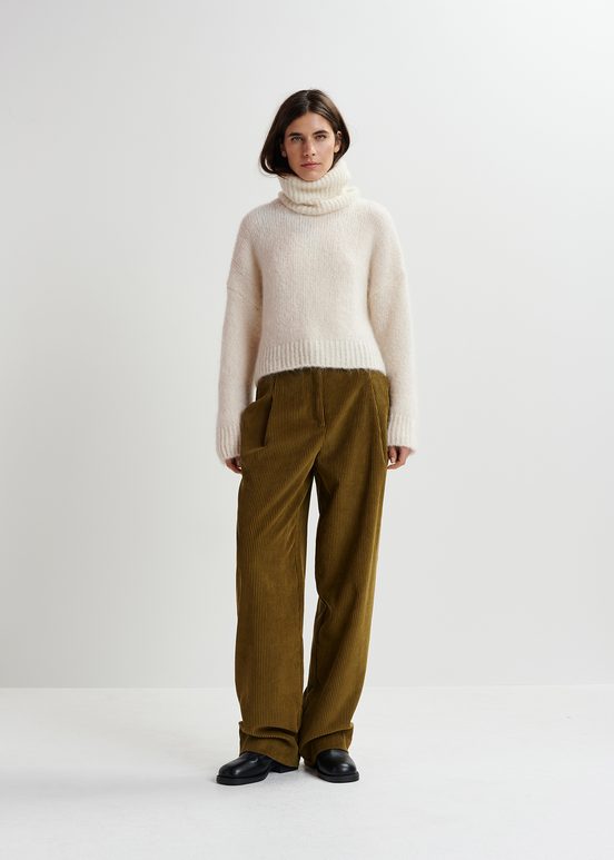 Ecru turtleneck knit sweater