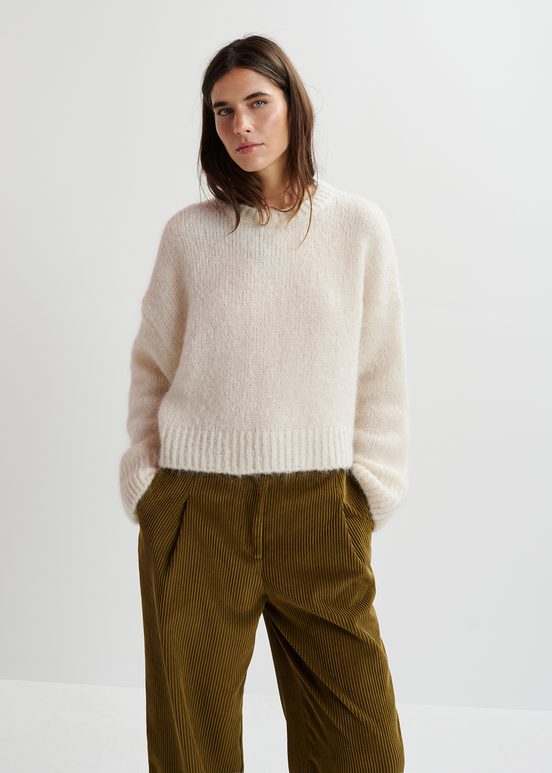 Ecru turtleneck knit sweater