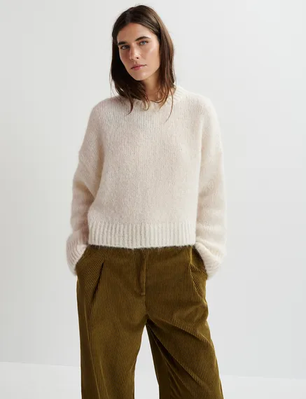 Ecru turtleneck knit sweater