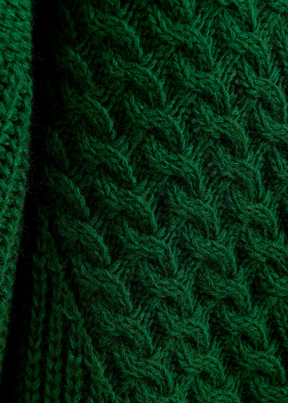 Dark green oversized cable-knitted sweater