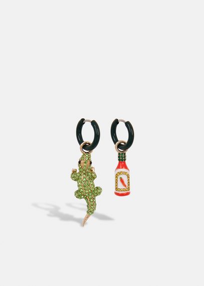 Black hoop earrings with crocodile and hot sauce pendants