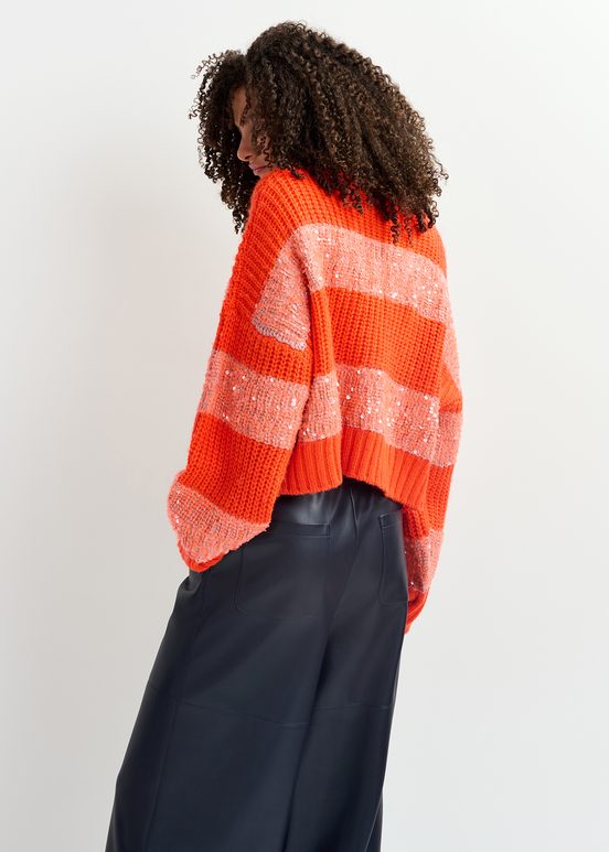 Orange knit sweater with sequin-embellished stripes