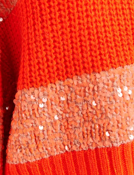 Orange knit sweater with sequin-embellished stripes