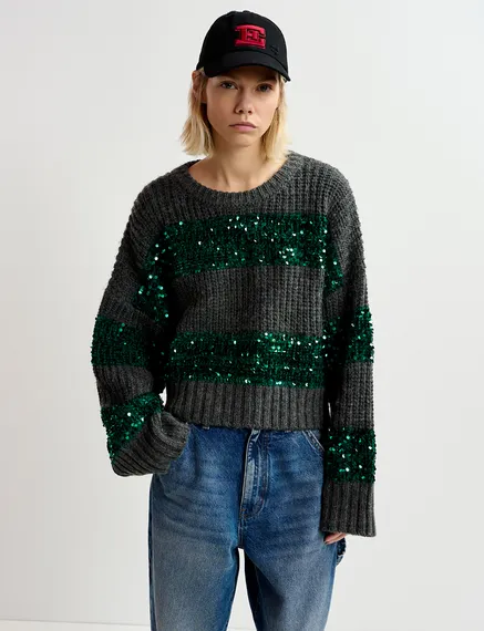 Pull en tricot gris foncé et vert foncé à rayures pailletées