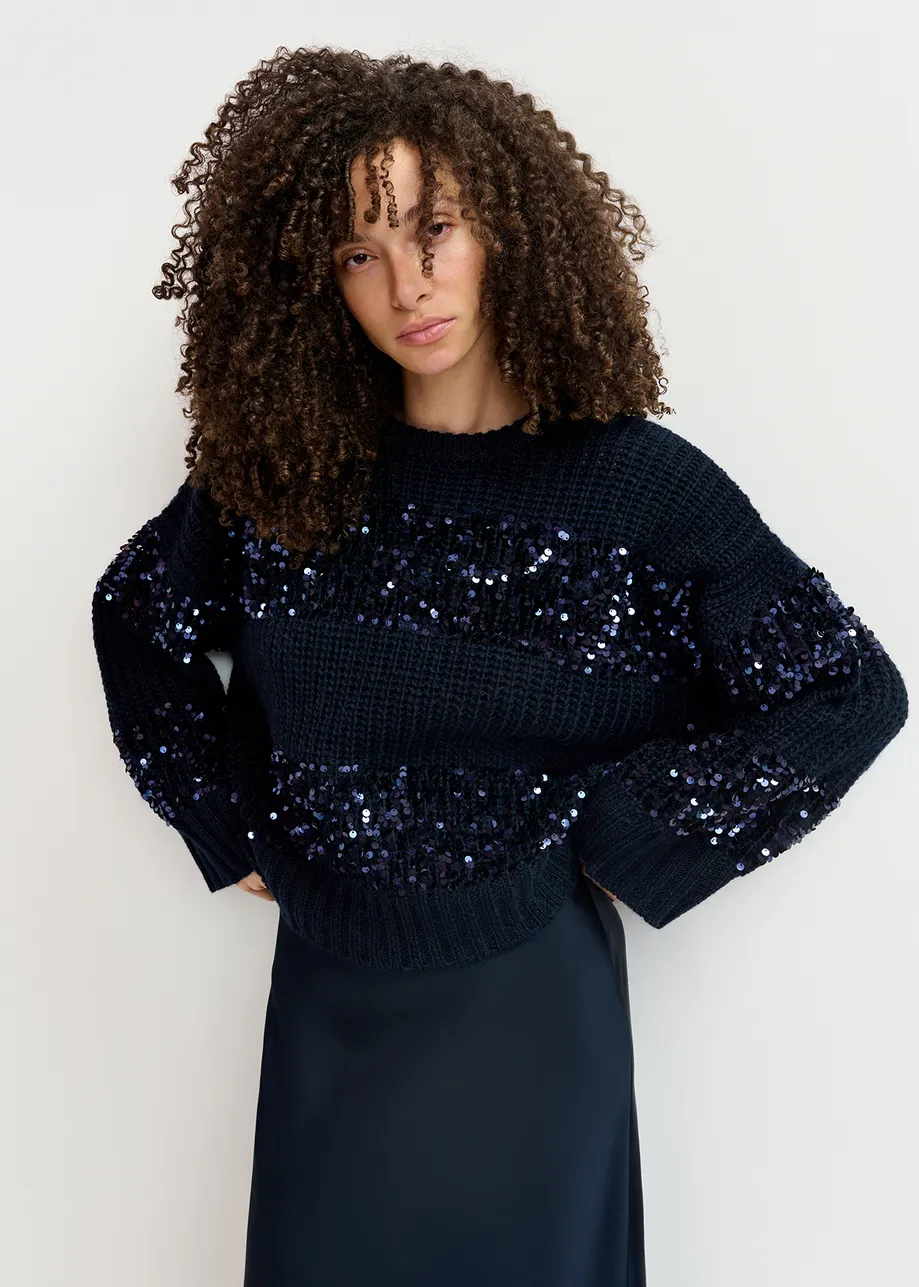 Navy blue knit sweater with sequin-embellished stripes