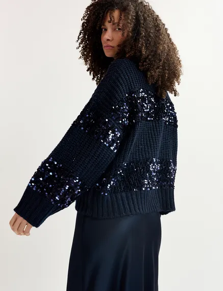 Navy blue knit sweater with sequin-embellished stripes