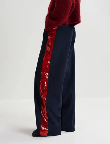 Navy blue cotton pants with sequin-embellished stripes