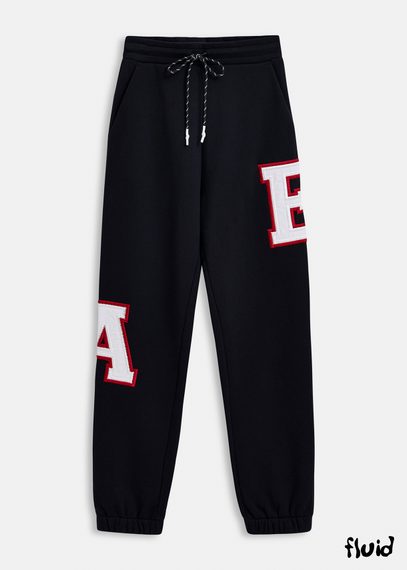 Black cotton sweatpants with embroidered patches