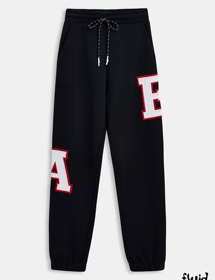 Black cotton sweatpants with embroidered patches