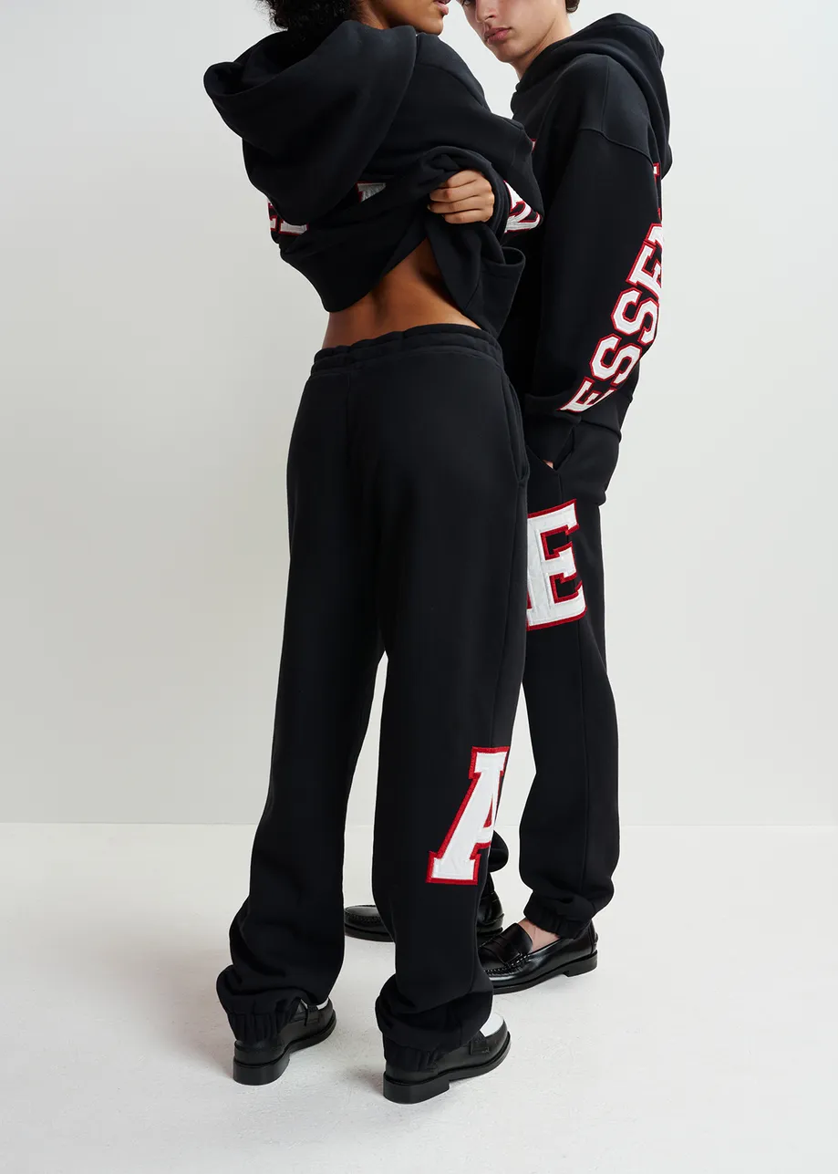 Black cotton sweatpants with embroidered patches