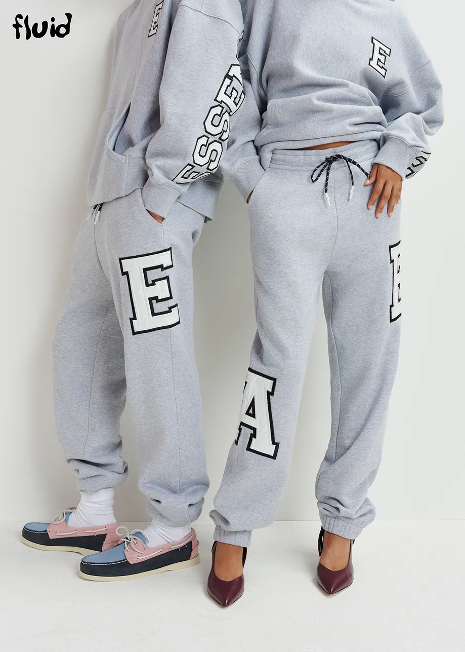 Grey cotton sweatpants with embroidered patches