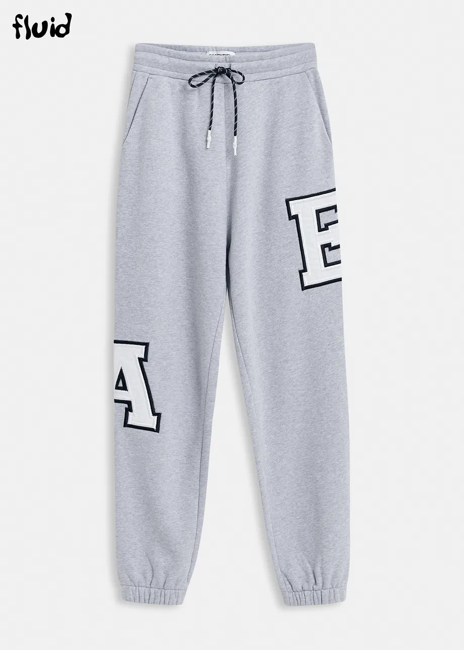 Grey cotton sweatpants with embroidered patches